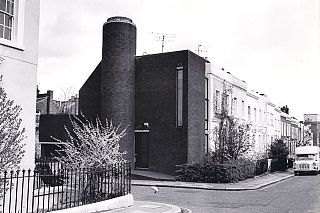 04-Ken place-exterior down street